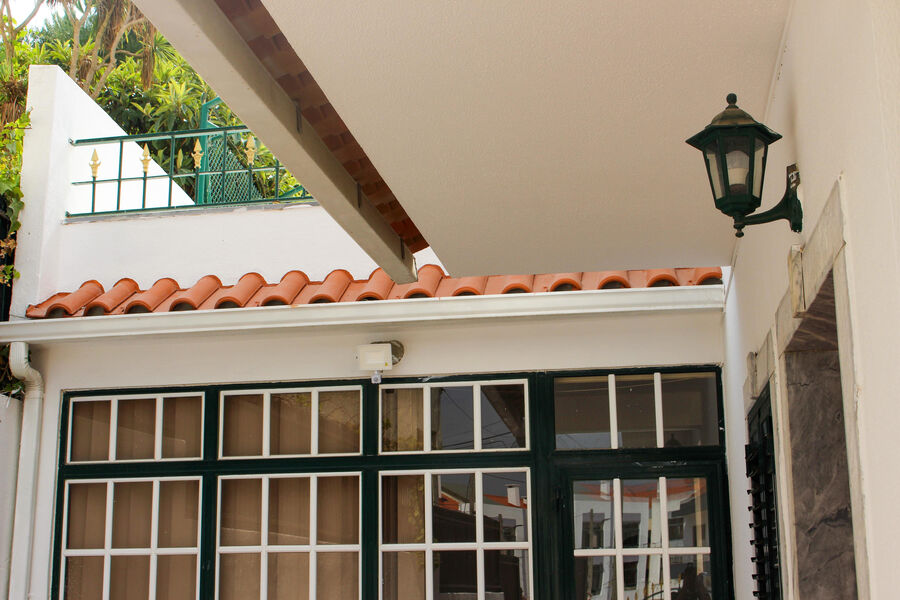 Porch with timber beam and restored window frames